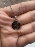 Double sided pallasite meteorite pendant necklace
